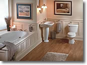 Stylish Bathroom with enclosed bath, pedastal sink, commode